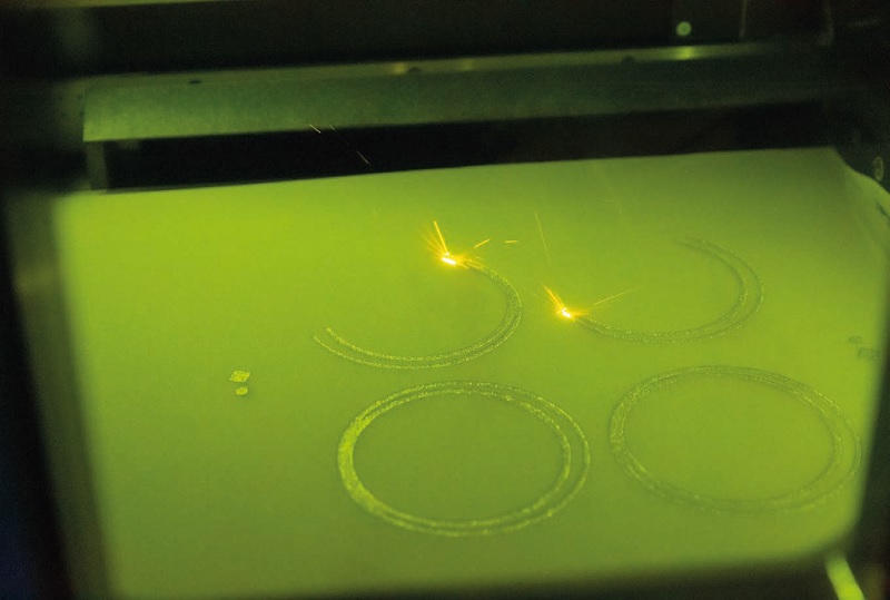 Insieme per l'additive manufacturing a letto di polvere