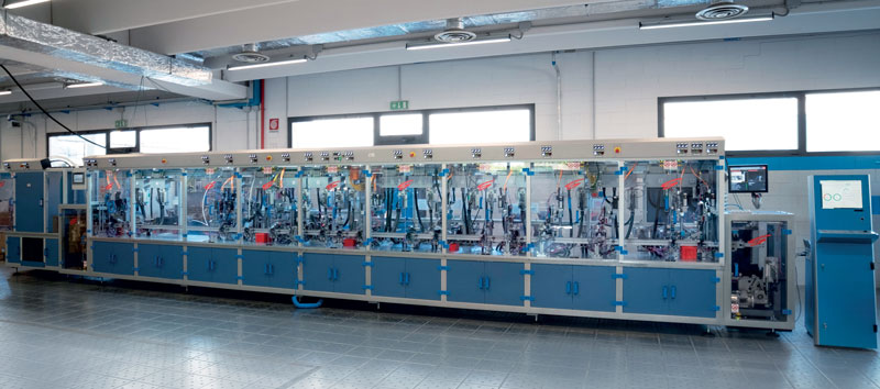 Plant for the assembly of switches: it ensures a production of 3,000 pieces/h, managing, in a fully automatic way, five product variants.